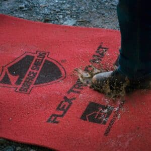 Worker walking on flex tread mat